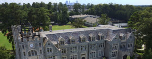 Aerial view of Lupton Hall with Atlanta skyline in the background.